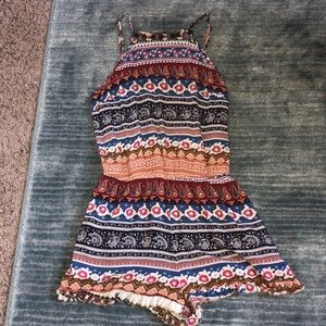 Patterned romper with opening in the back